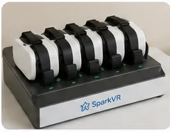 SparkVR headsets charging in an organized docking station